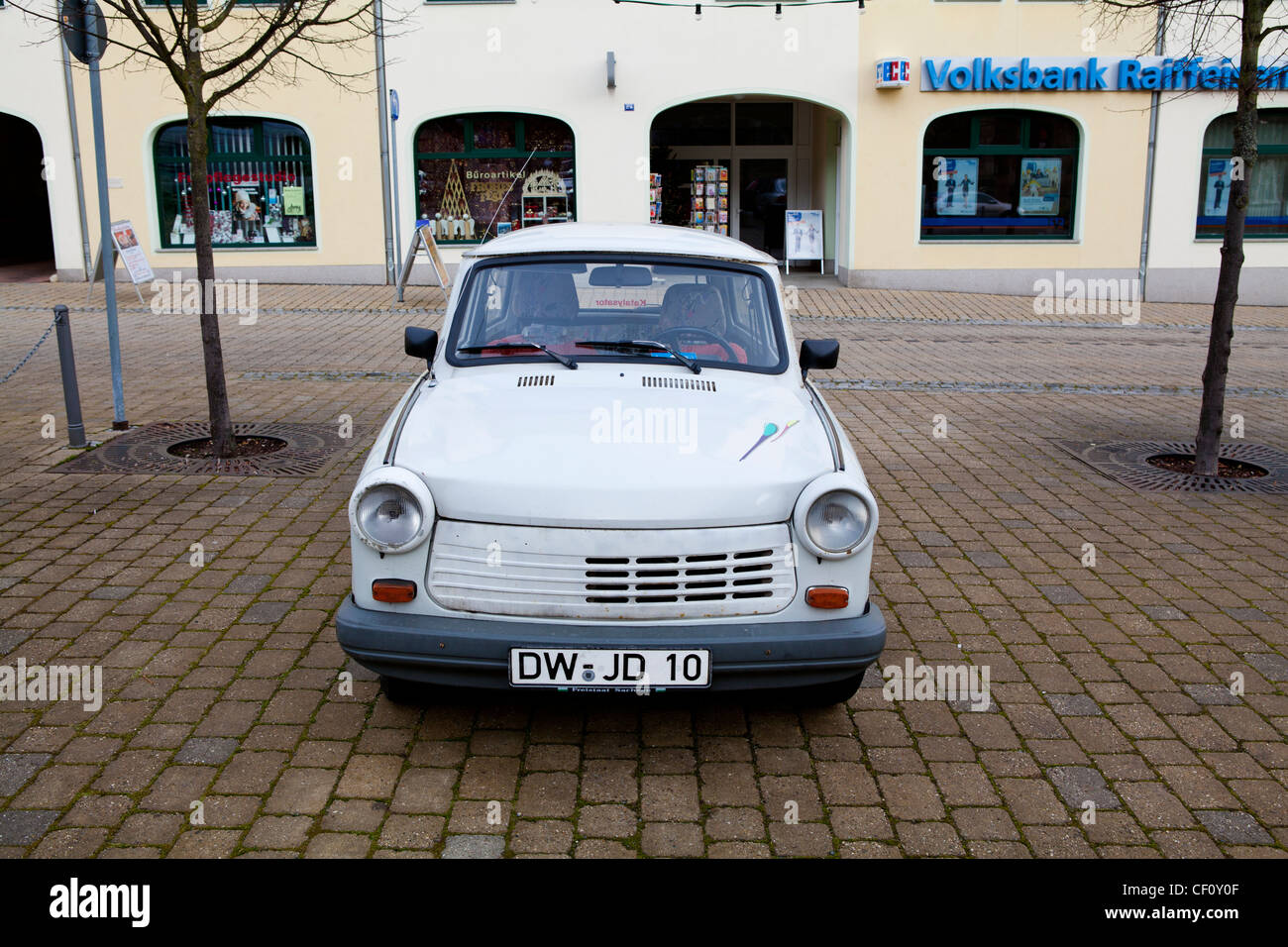 East German Trabant car park up at shops. Stock Photo