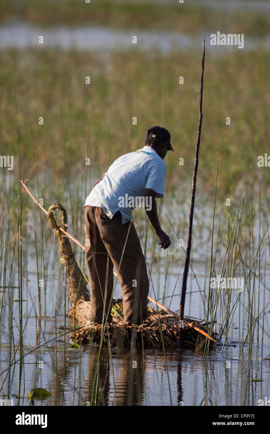 Man fishing from reed boat hi-res stock photography and images - Alamy