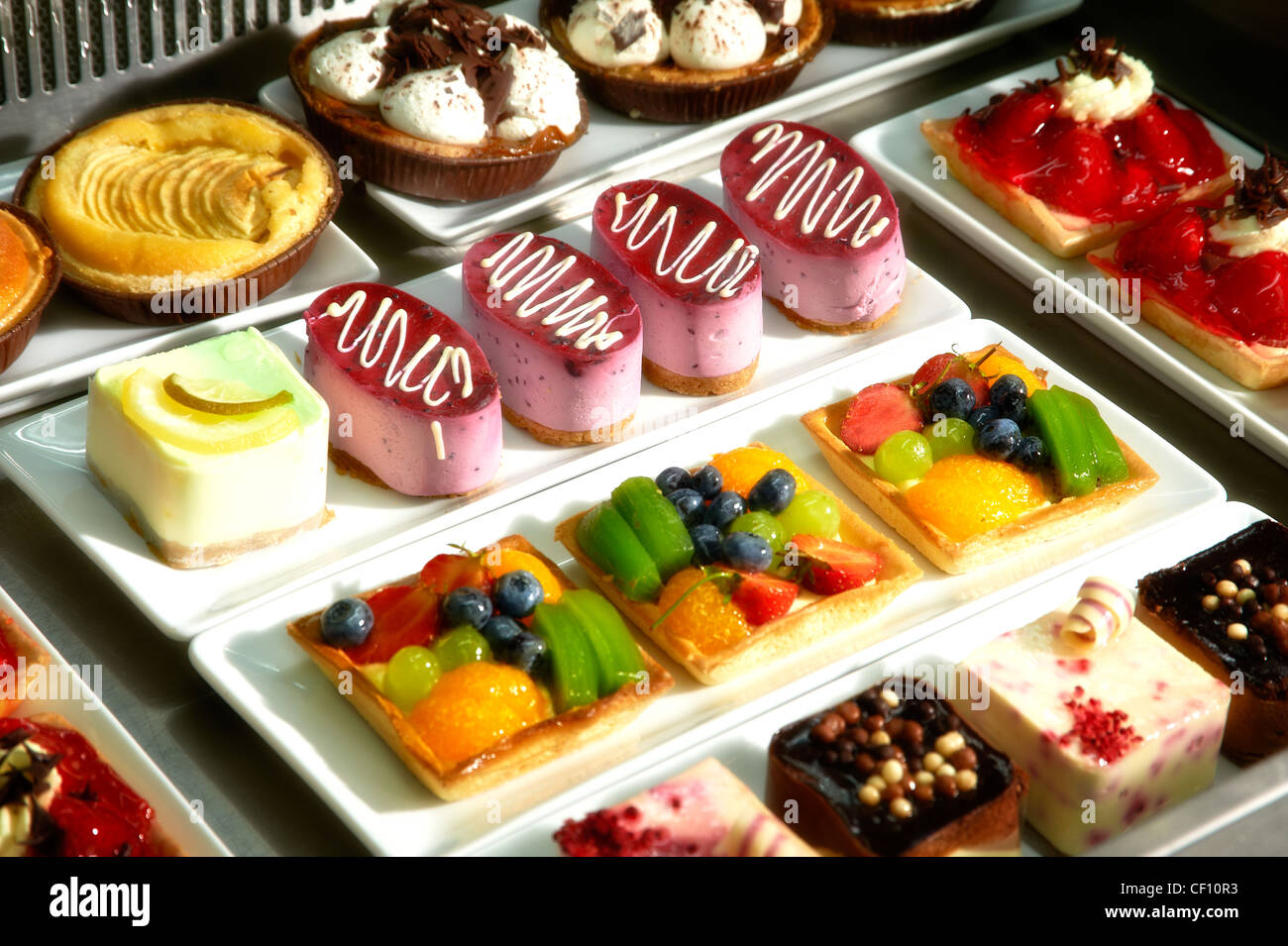 A display of luxury colourful cakes Stock Photo Alamy