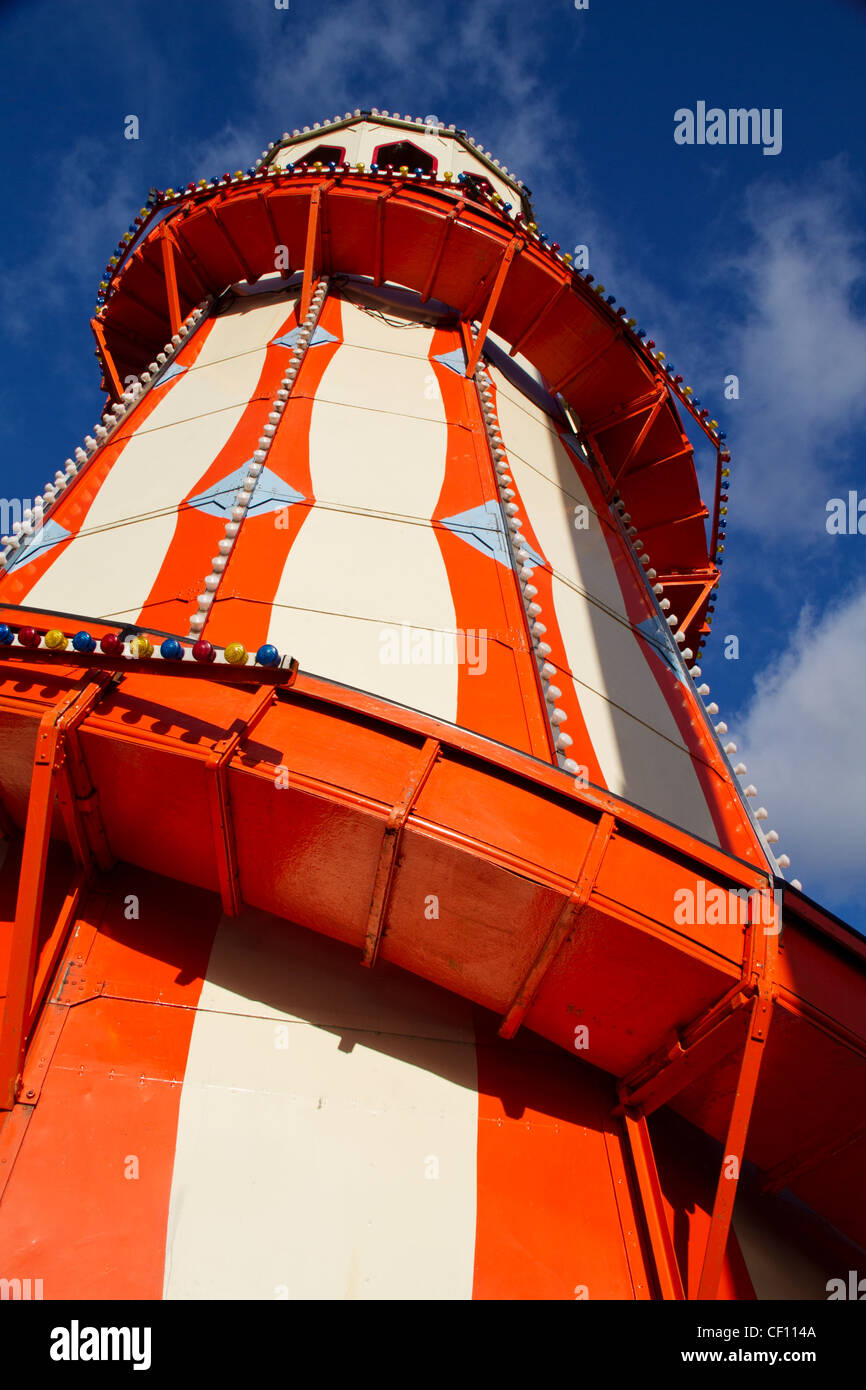 Orange and white helter skelter on the South Bank in London against a blue sky. Stock Photo