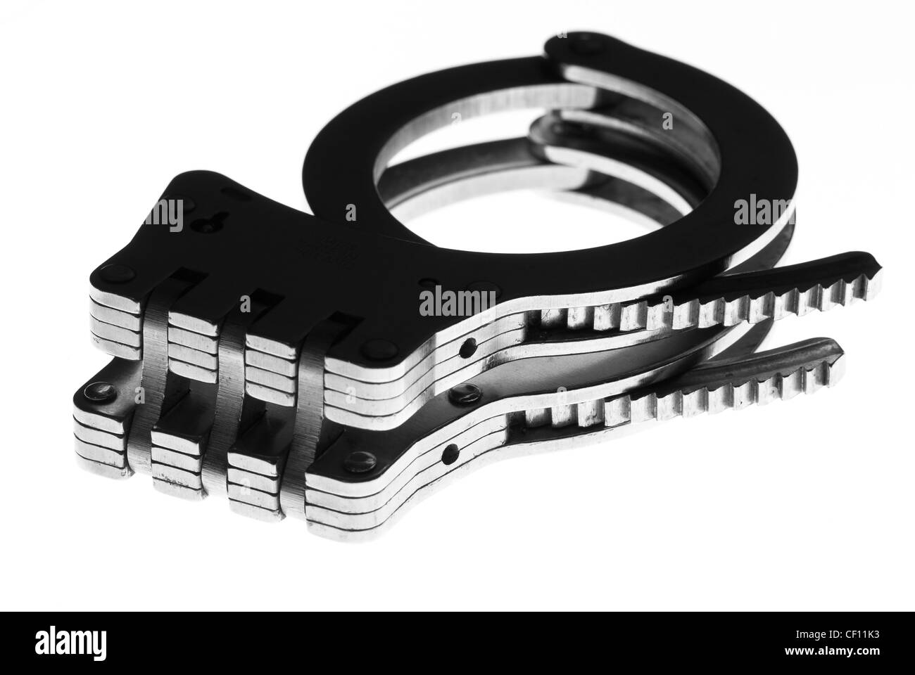 Black handcuffs hi-res stock photography and images - Alamy