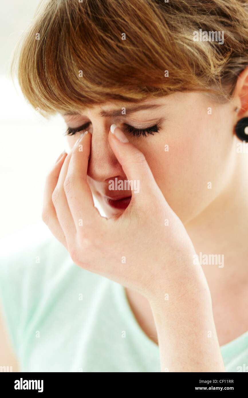 Girl with blocked sinuses Stock Photo Alamy