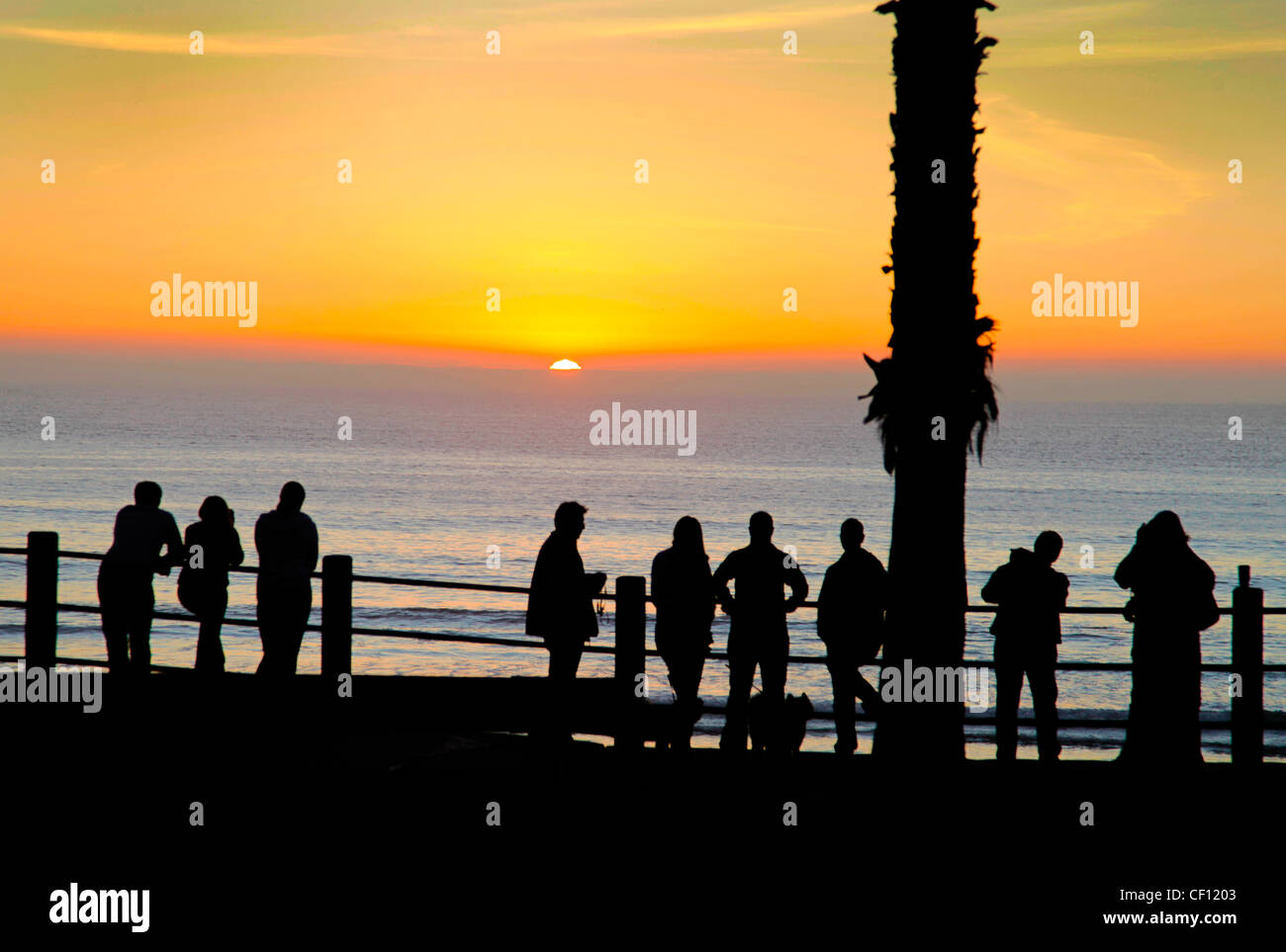 WATCHING SUNSET OVER THE PACIFIC,CALIFORNIA,USA Stock Photo