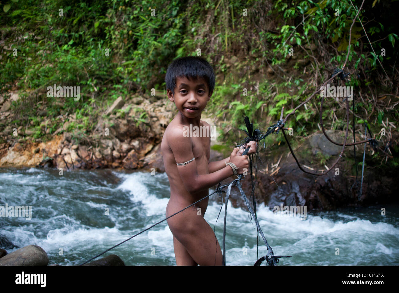 Indonisaian  boy river swim alamy Boys swim in polluted river hi-res stock photography and ...