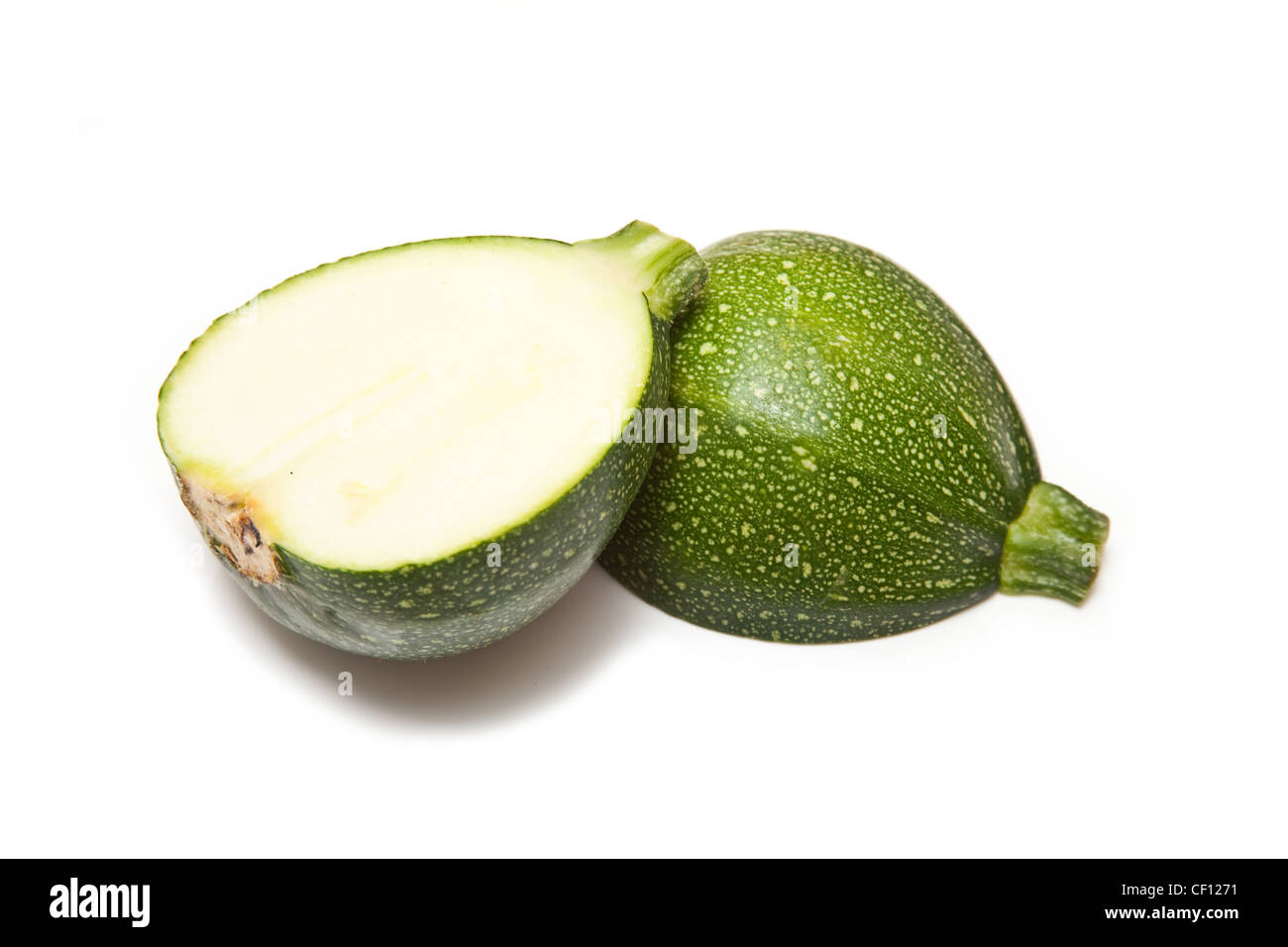 Globe courgette isolated on a white studio background. Stock Photo
