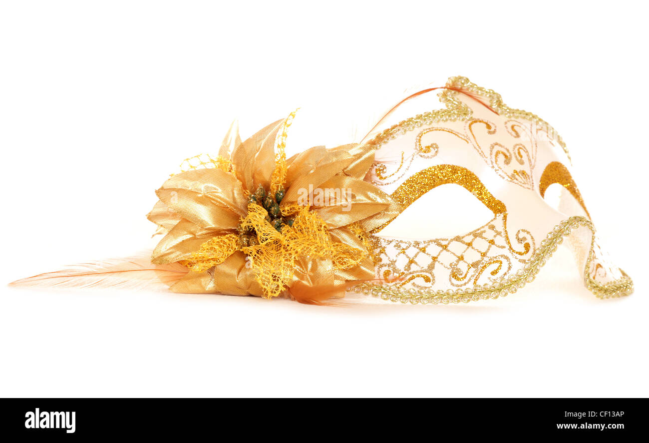 Gold masquerade mask on white background Stock Photo