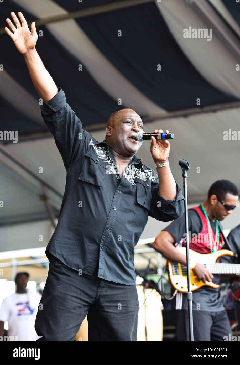 Tabou Combo of Haiti playing at the New Orleans Jazz and Heritage Festival in New Orleans, LA on the final day of the festival. Stock Photo