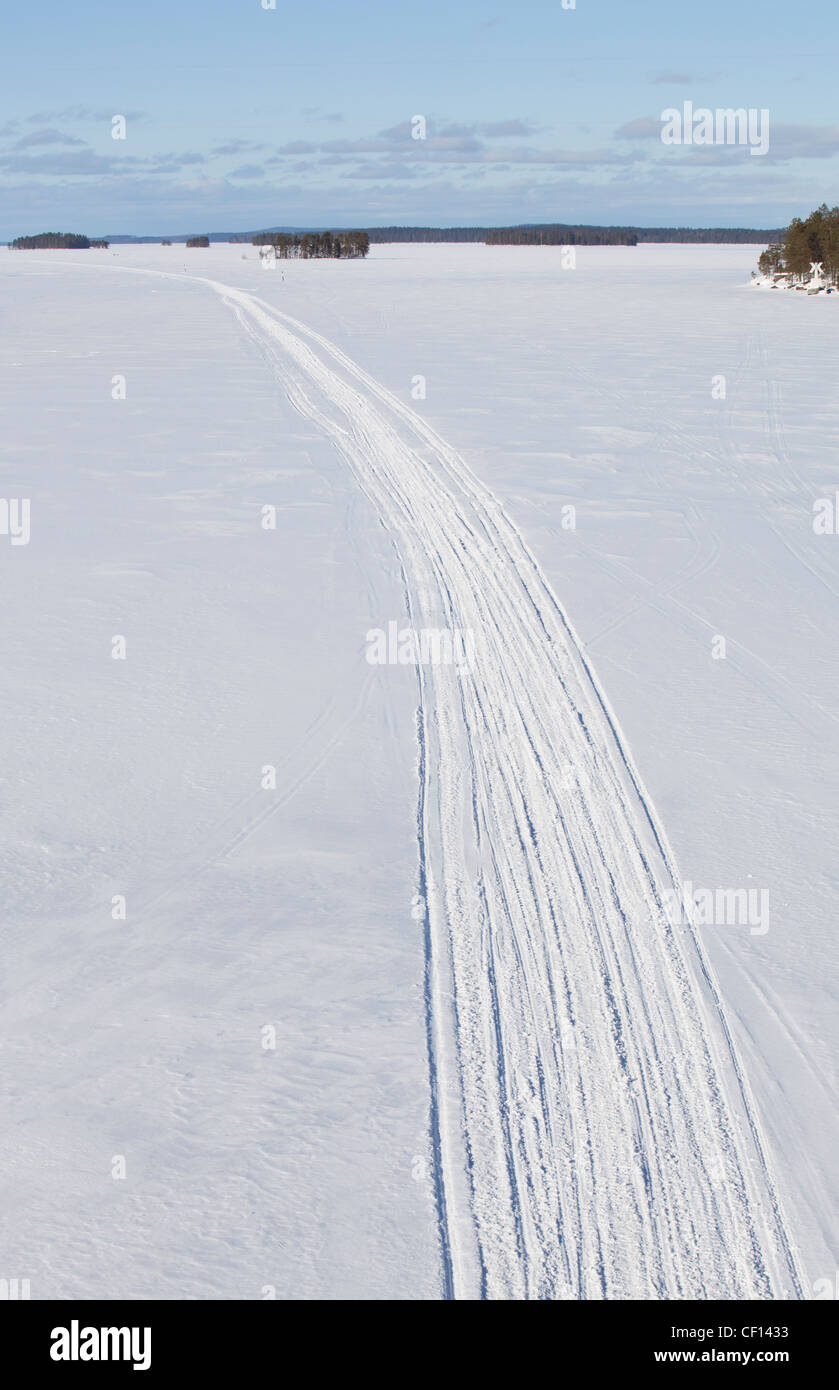 Aerial view of snowmobile route on lake ice at Winter , Finland Stock Photo
