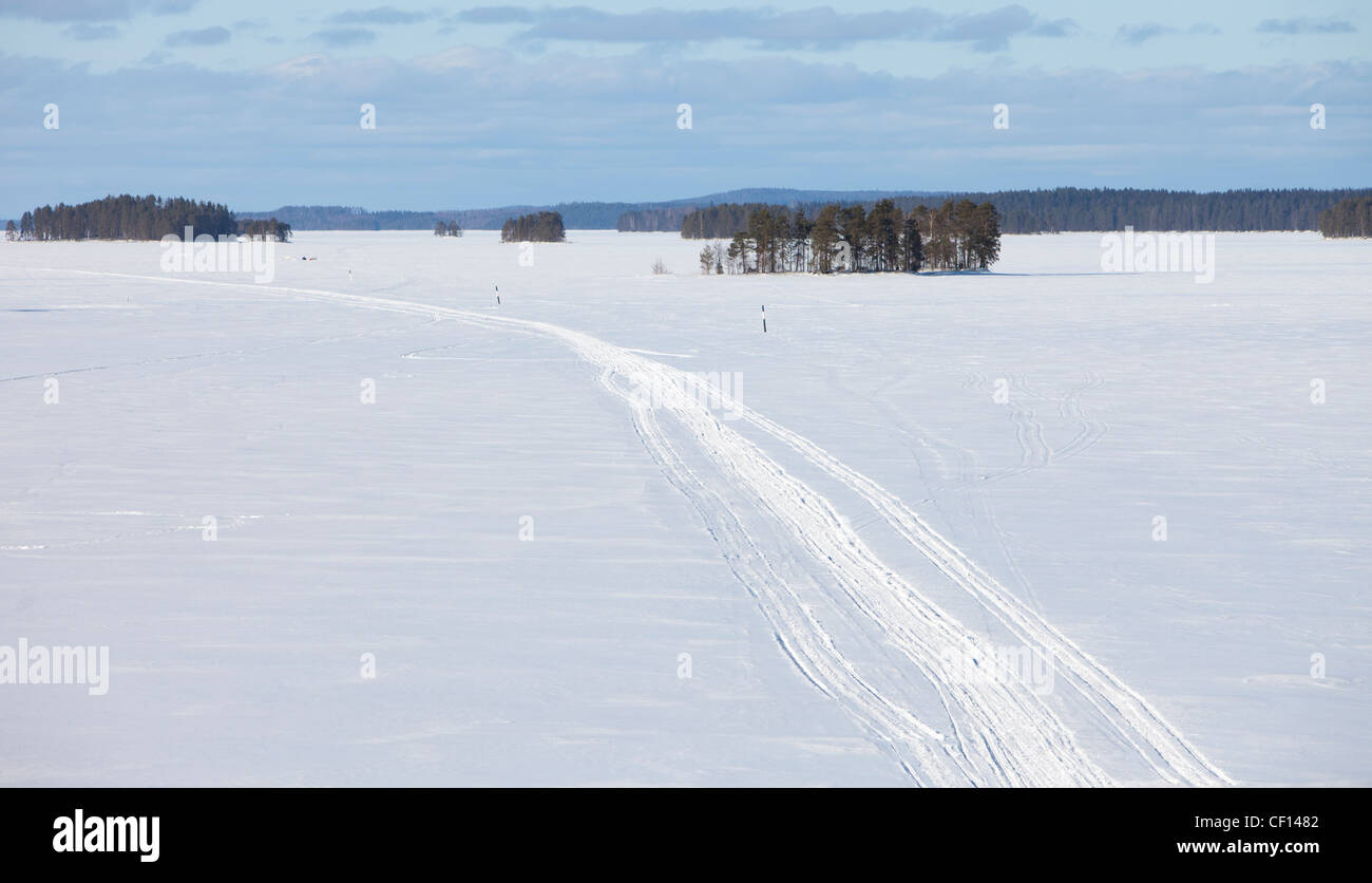 Aerial view of snowmobile route on lake Pohjois-Konnevesi ice at Winter , Finland Stock Photo