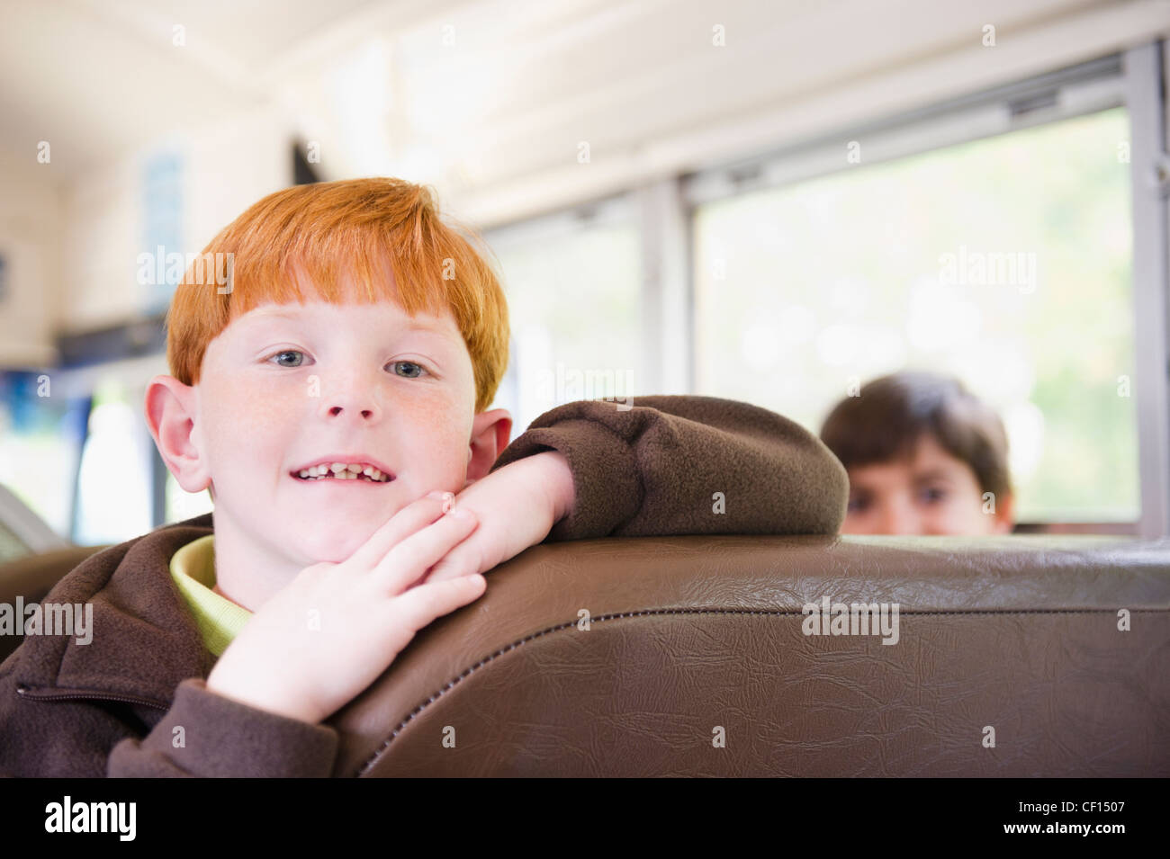 Children riding school bus Stock Photo Alamy
