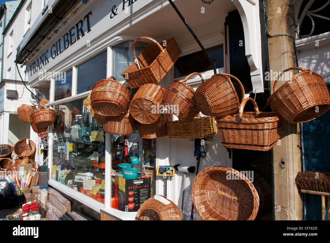 Wicker baskets hanging outside in a shop front display Stock Photo