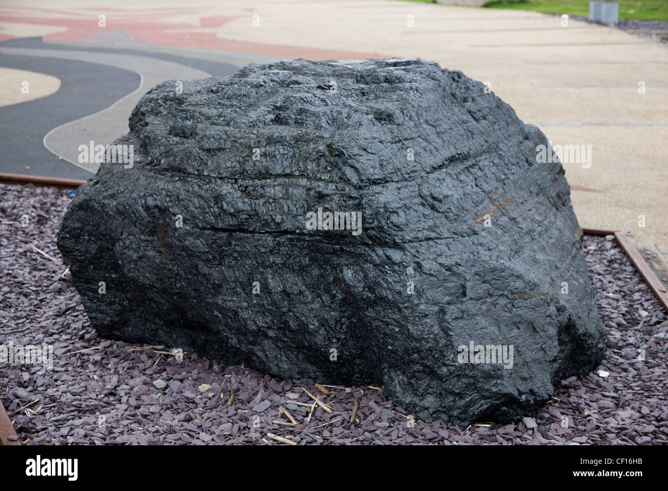 Large lump of mined anthracite coal on display in Cardiff Bay Stock
