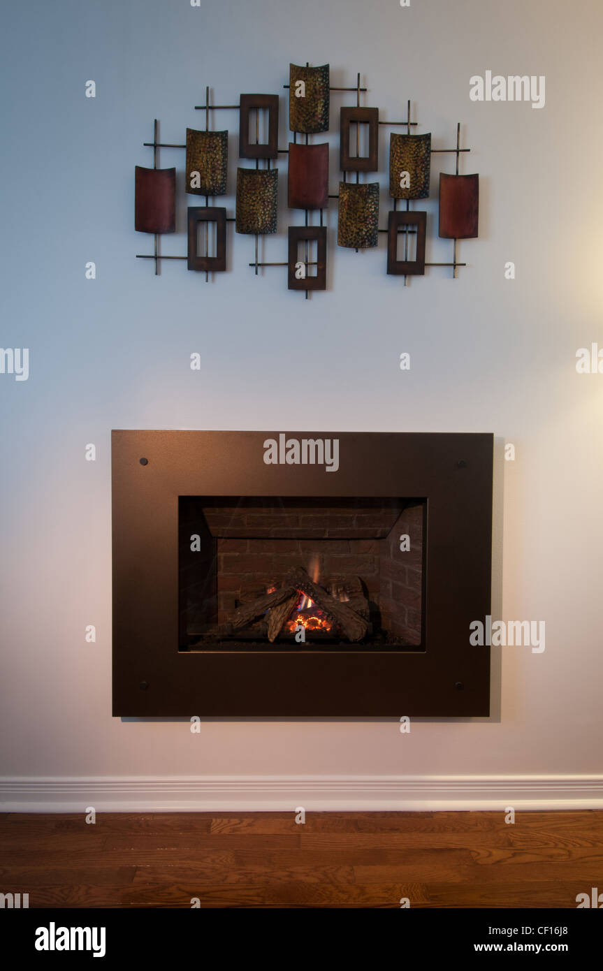 Gas burning fireplace in luxury residential home. Stock Photo