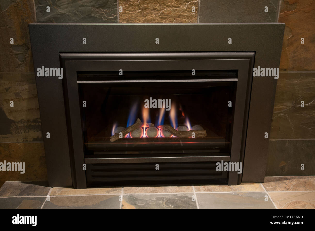 Gas burning fireplace in luxury residential home Stock Photo Alamy