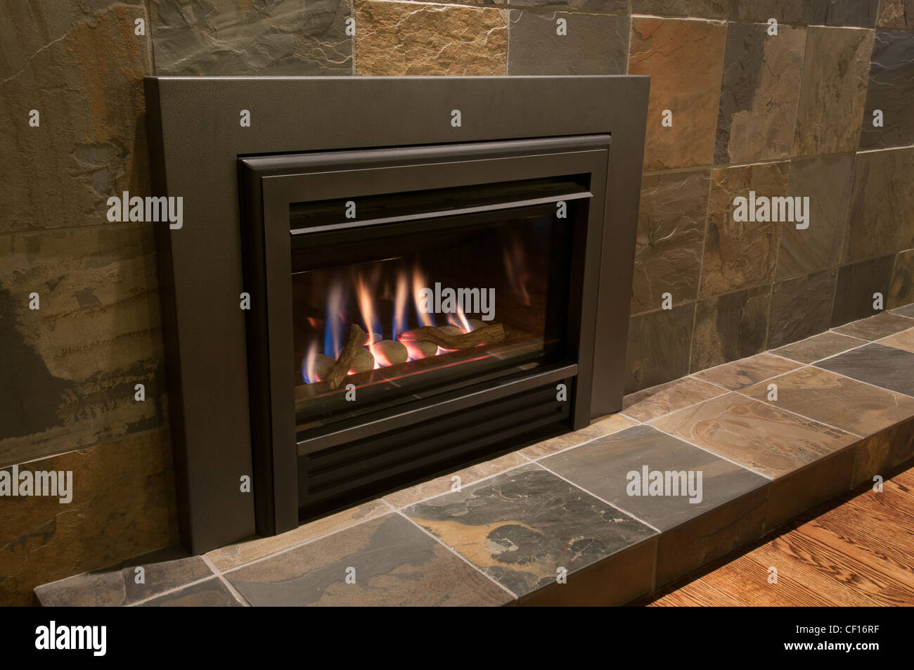 Gas burning fireplace in luxury residential home Stock Photo Alamy