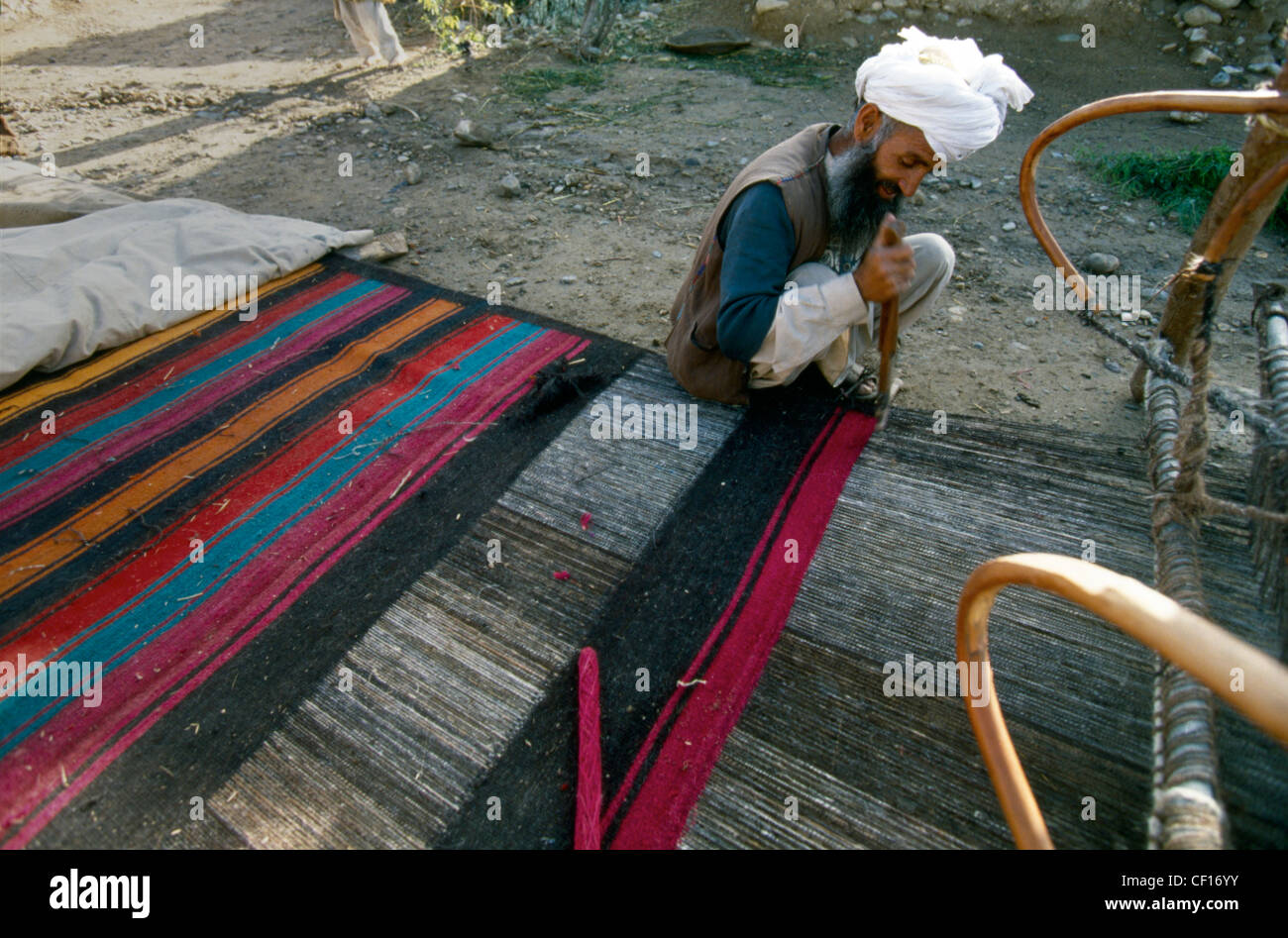 Carpet maker in Afghanistan Stock Photo Alamy