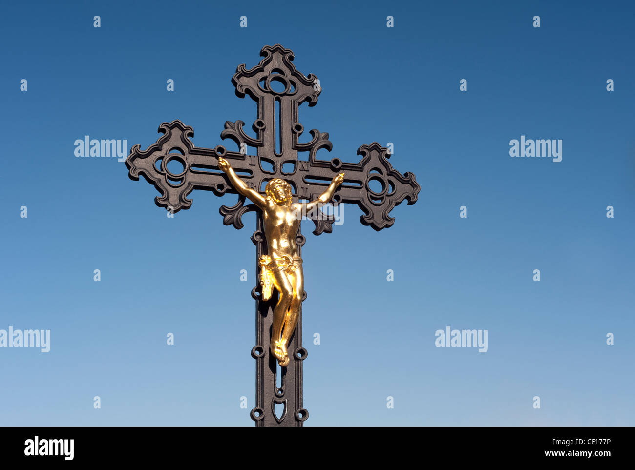 Jesus on the cross at cemetery Stock Photo