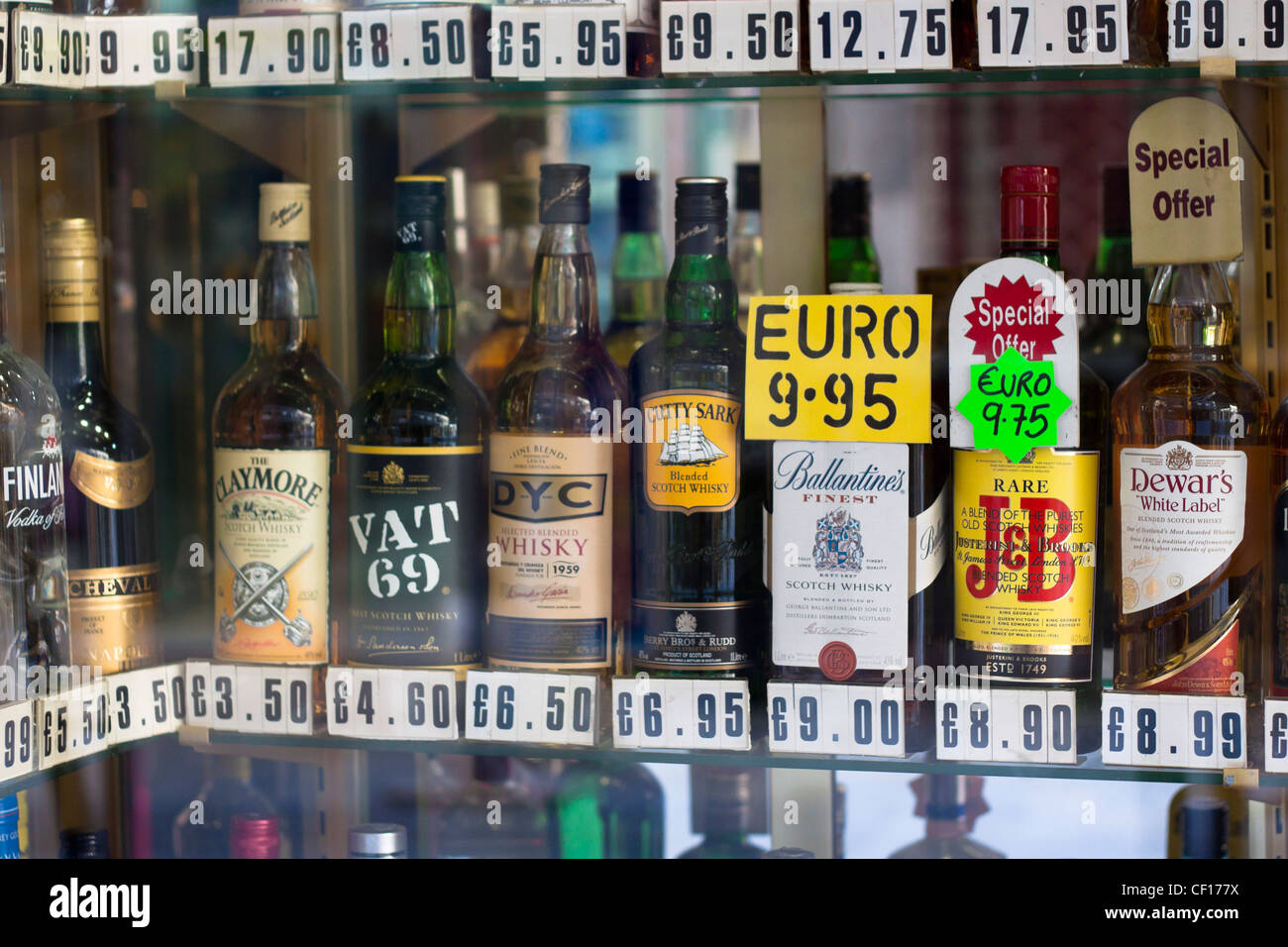 Detail of duty free shop window with displayed bottles of whisky. Main Street, Gibraltar. Stock Photo
