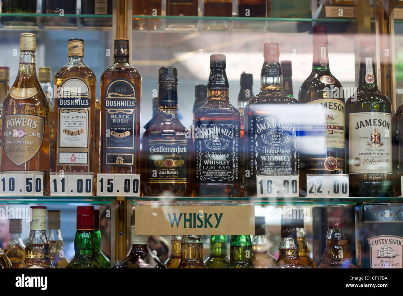Detail of duty free shop window with displayed bottles of whisky. Main Street, Gibraltar. Stock Photo