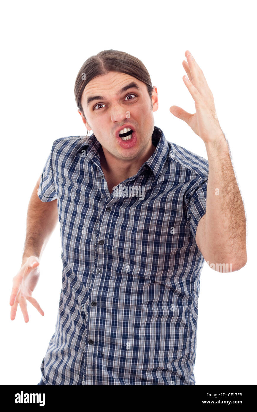 Young upset angry man gesturing, isolated on white background. Stock Photo