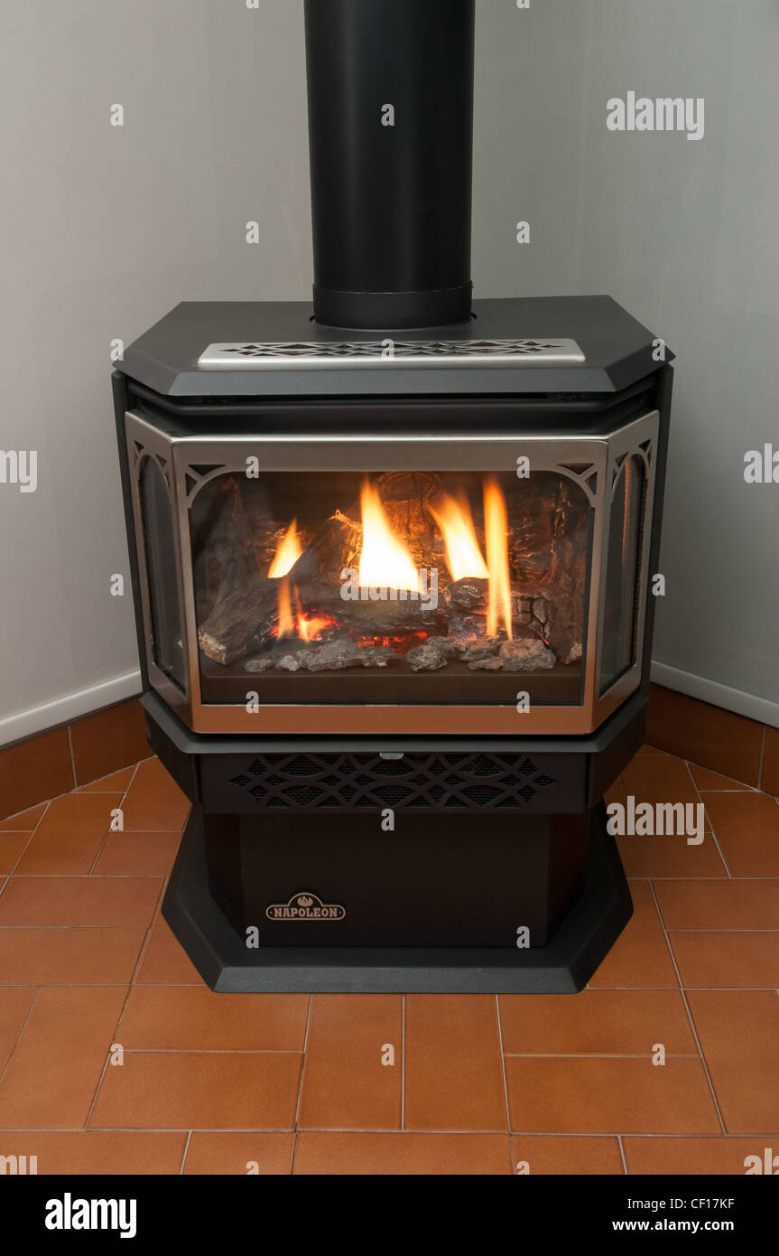 Gas burning fireplace in residential home Stock Photo Alamy