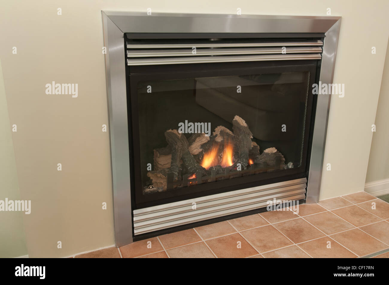 Gas burning fireplace in residential home Stock Photo Alamy