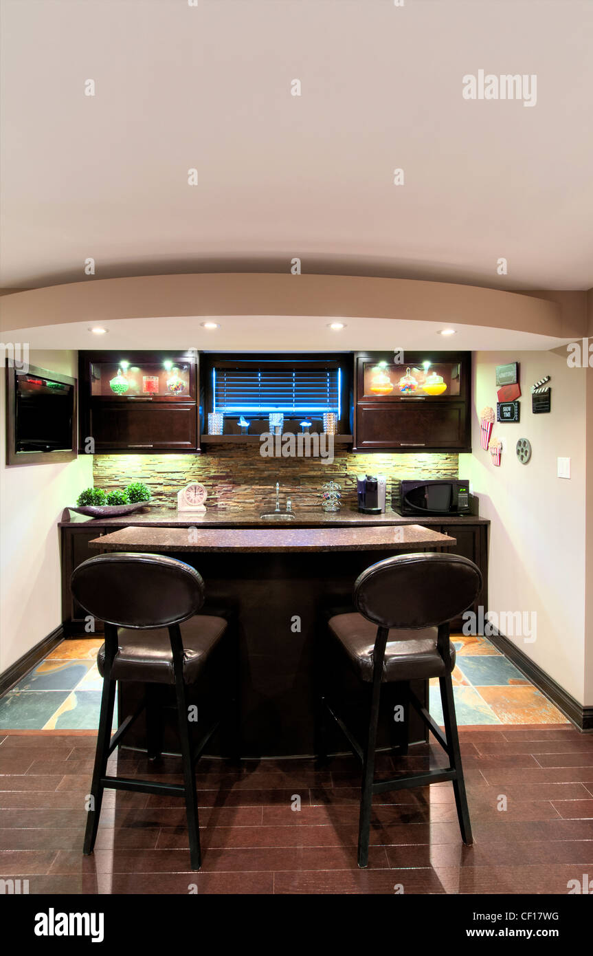 Luxurious residential basement bar with television Stock Photo Alamy