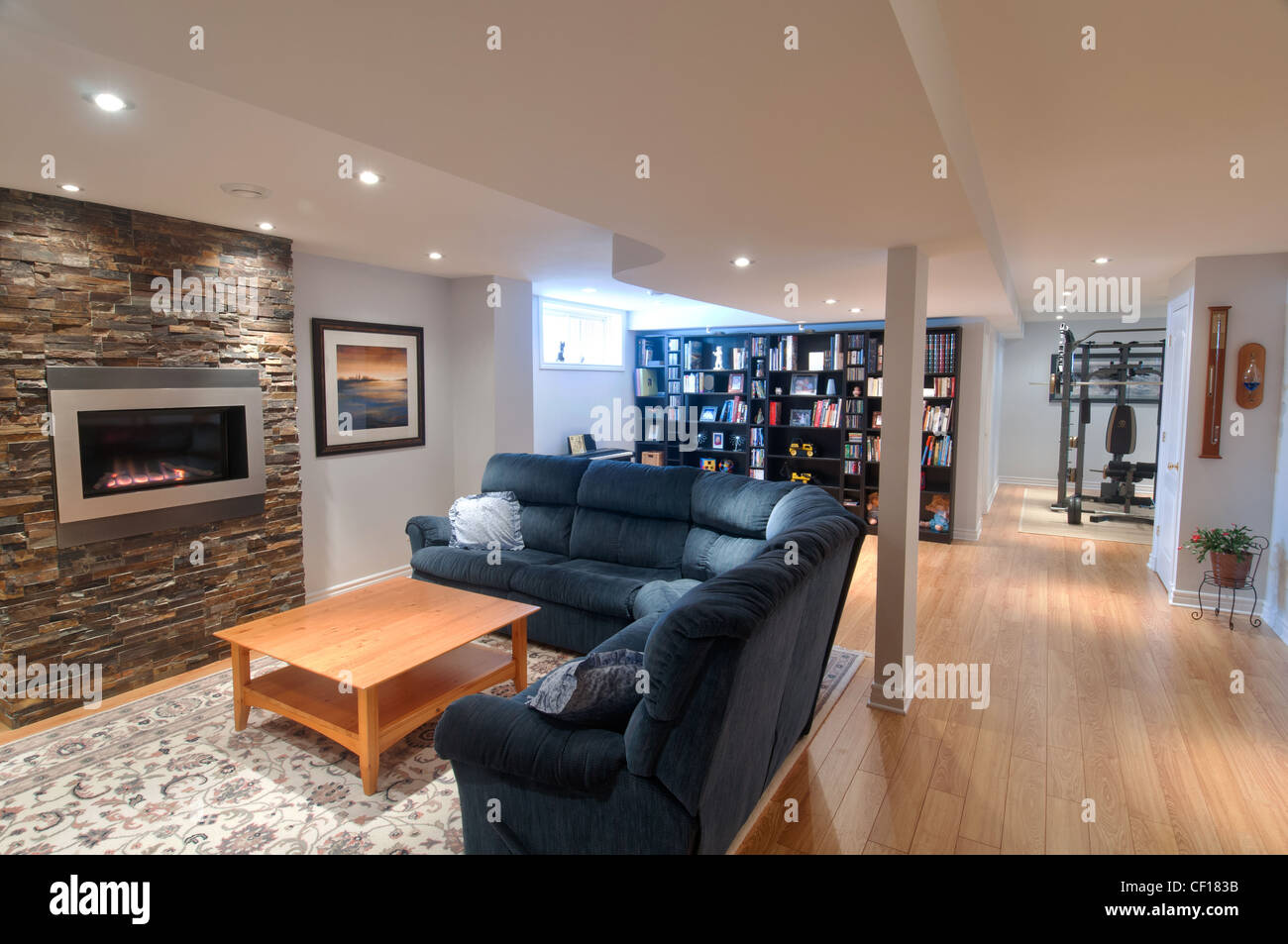 Luxury Basement Living Room With Gas Fireplace Stock Photo