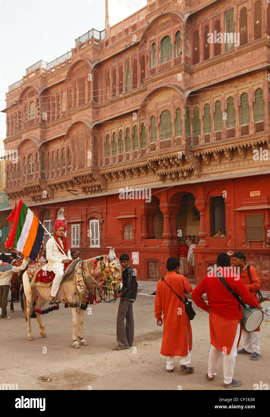 India, Rajasthan, Bikaner, Old City, street scene, procession, people, Stock Photo