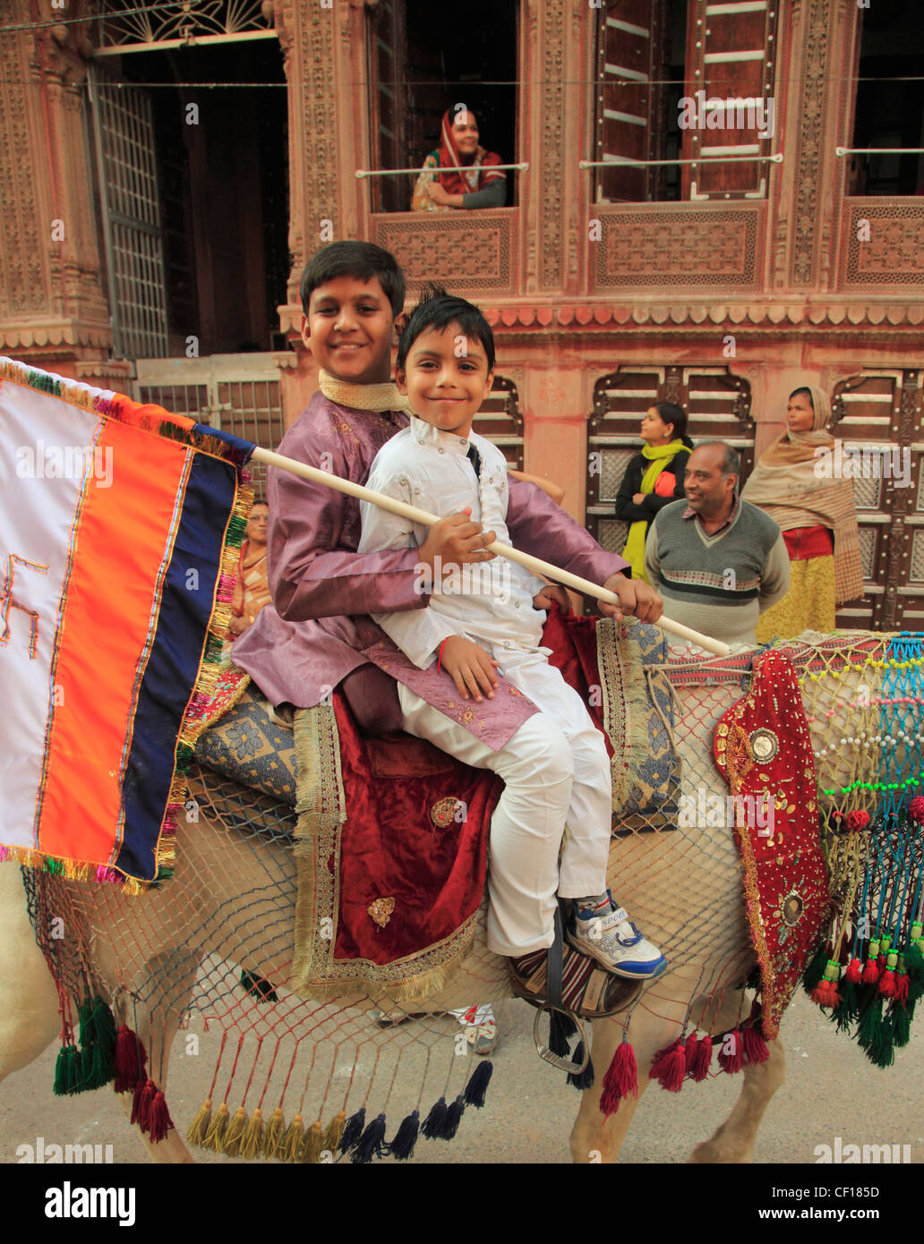 India, Rajasthan, Bikaner, Old City, street scene, procession, people, Stock Photo