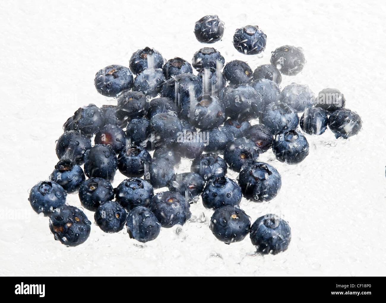 Blueberries in water splash Stock Photo Alamy