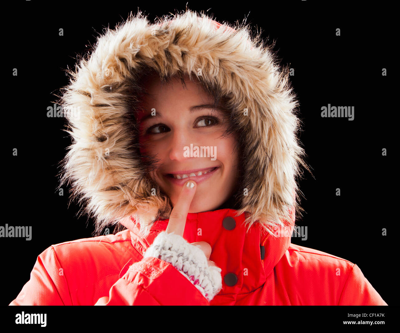Caucasian woman wearing fur-hooded coat Stock Photo