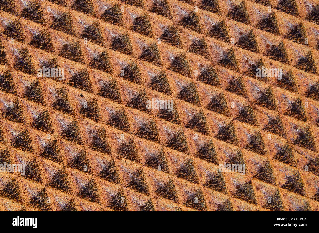 background of rusty iron metal with diamond texture pattern Stock Photo