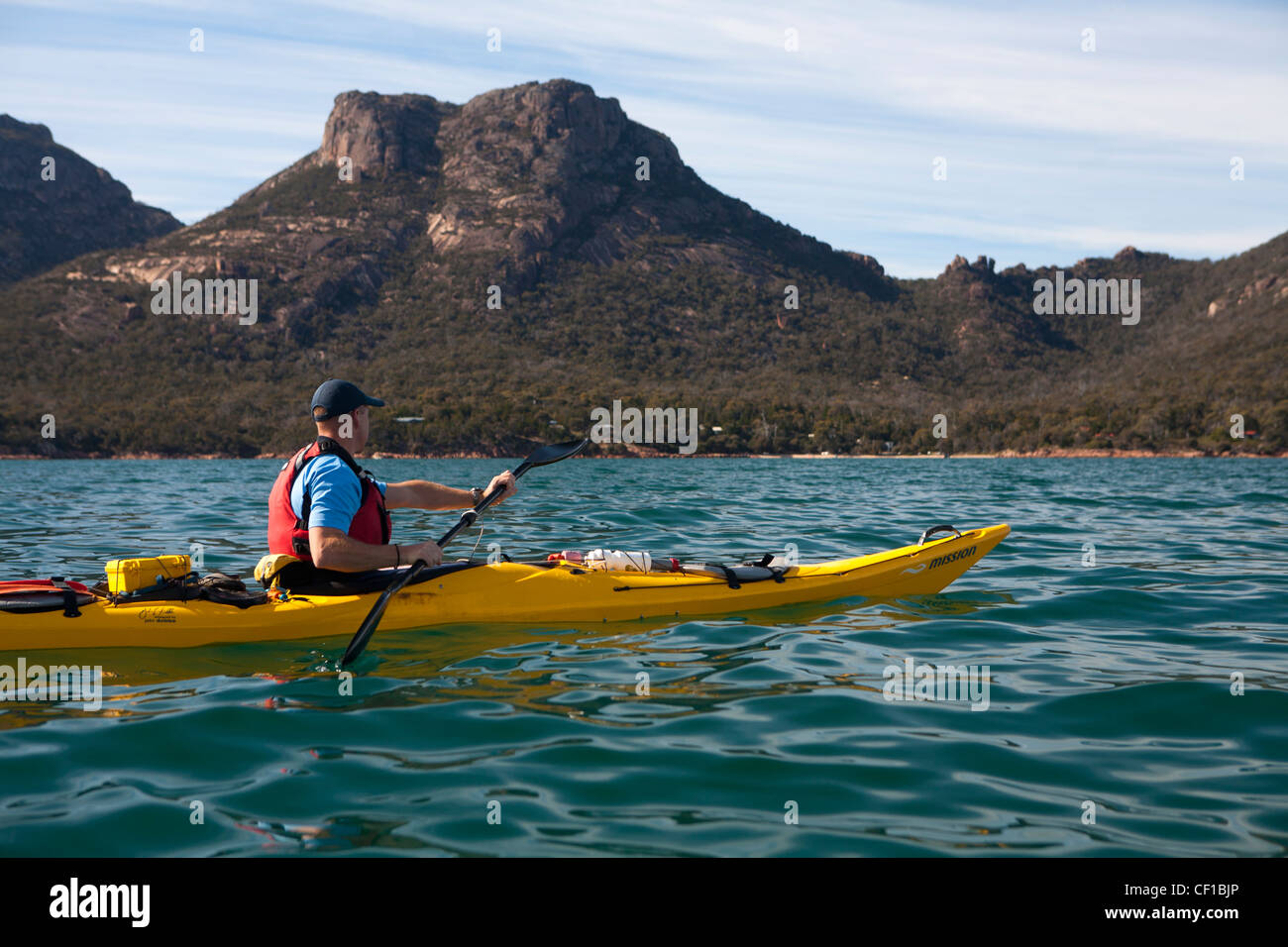 Kayaking beneath the Hazards at Freycinet National Park, Tasmania Stock Photo