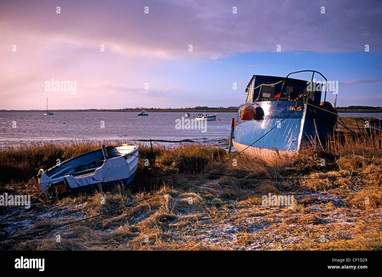 Boats above the high tide line. Stock Photo