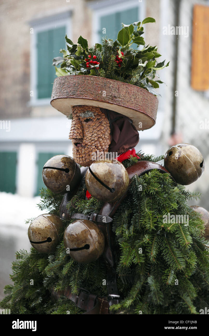 Residents take part in the annual tradition of Silvesterchläusen held on New Years Eve in the old town of Urnäsch, Switzerland Stock Photo