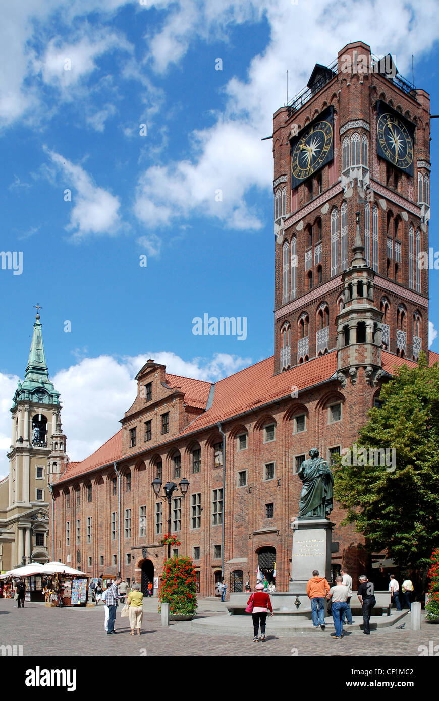 City hall in the old town of Torun with memorial for the astronomer Nicolaus Copernicus. Stock Photo