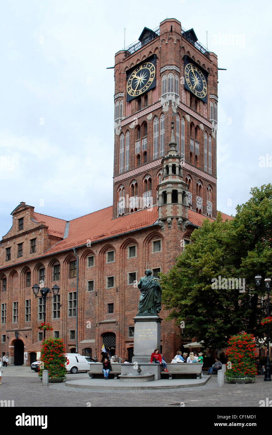 City hall in the old town of Torun with memorial for the astronomer Nicolaus Copernicus. Stock Photo