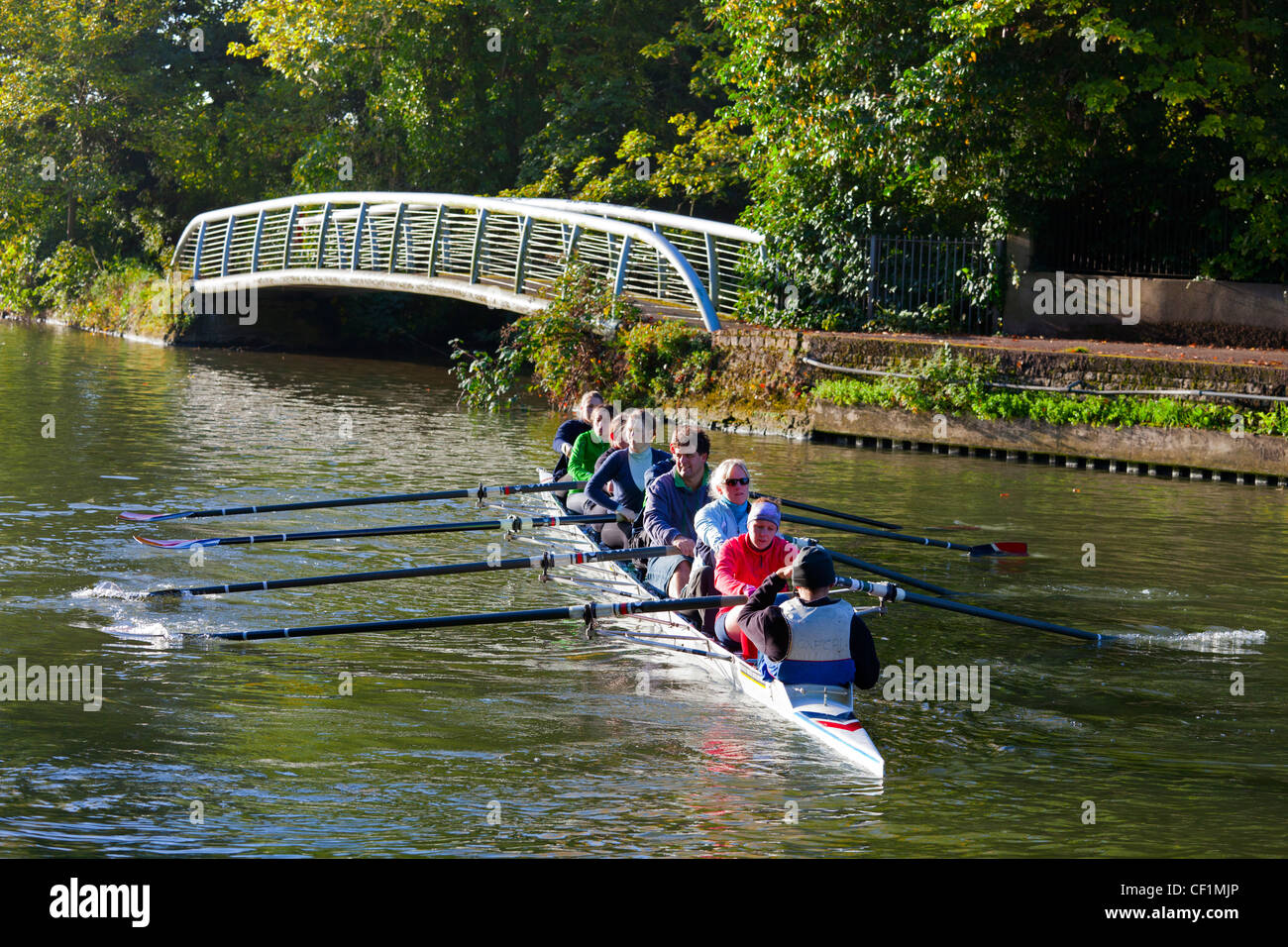 Students from Oxford University rowing as an eight on the River Thames