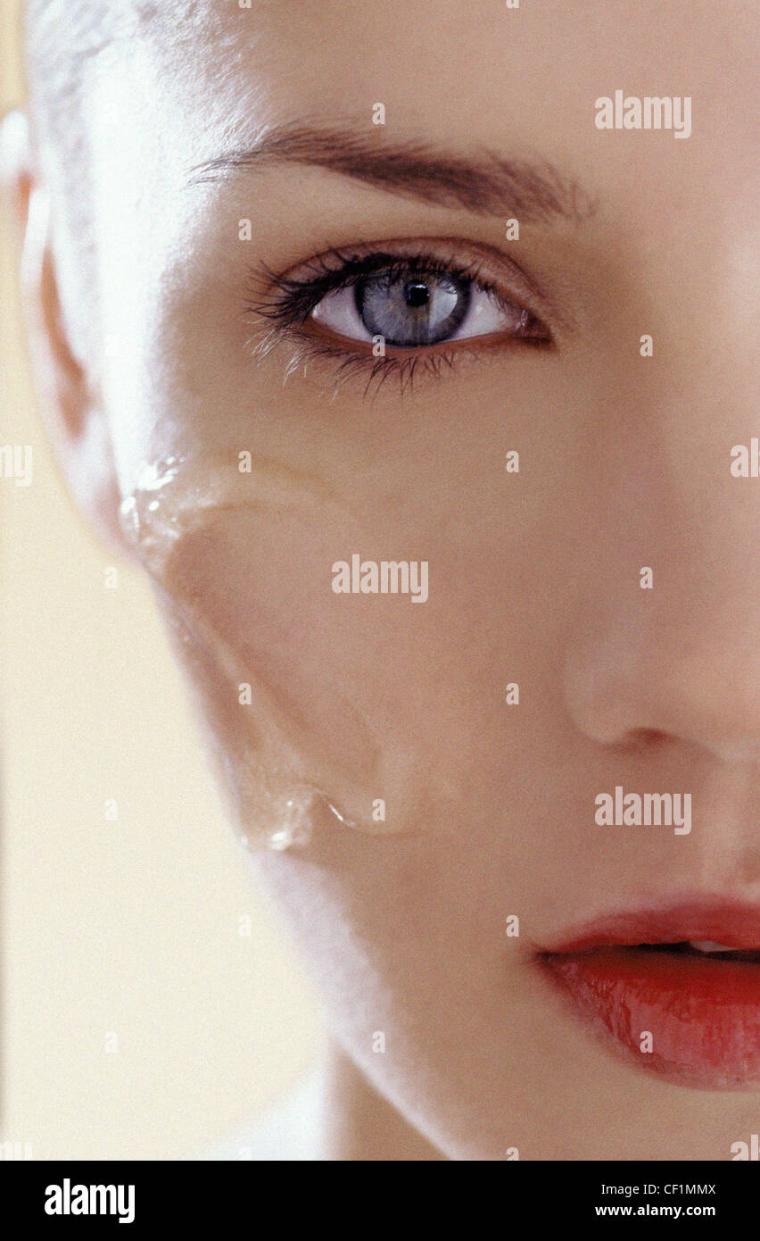 Female with clear gel on cheek Andrea Ciriminna Stock Photo - Alamy