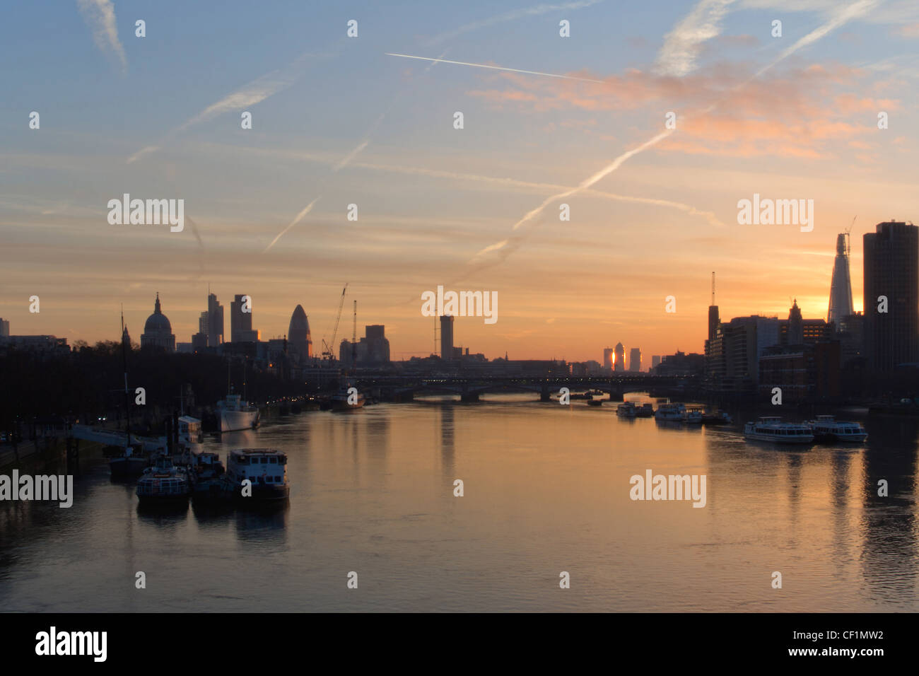 View of St. Paul's cathedral and the river Thames at sunrise. London. UK Stock Photo