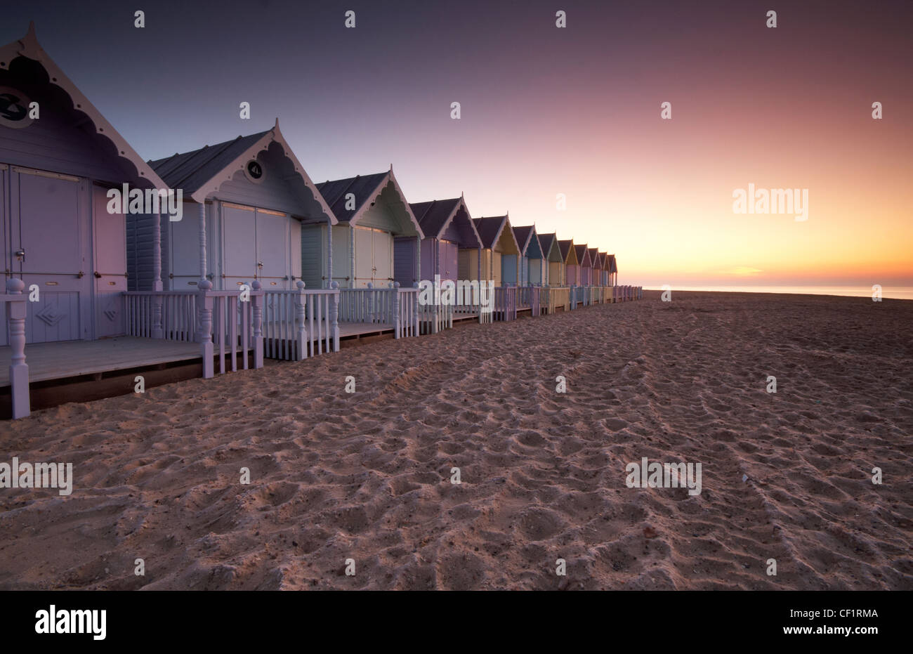 Early dawn over new beach huts on Mersea Island. Stock Photo