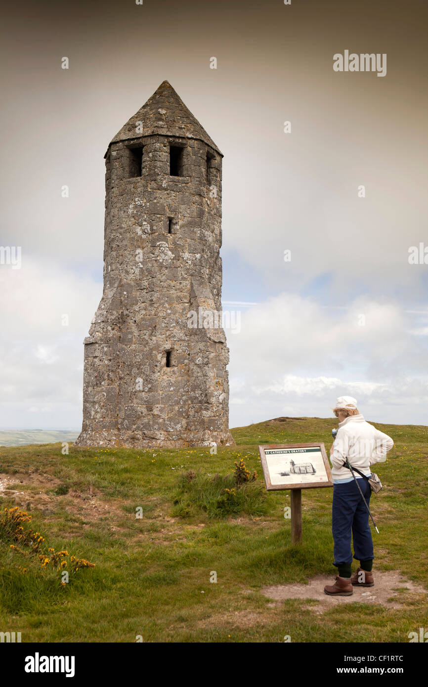 UK, England, Isle of Wight, Gore Down, visitor at St Catherine’s Oratory, (the Pepper Pot) medieval tower Stock Photo