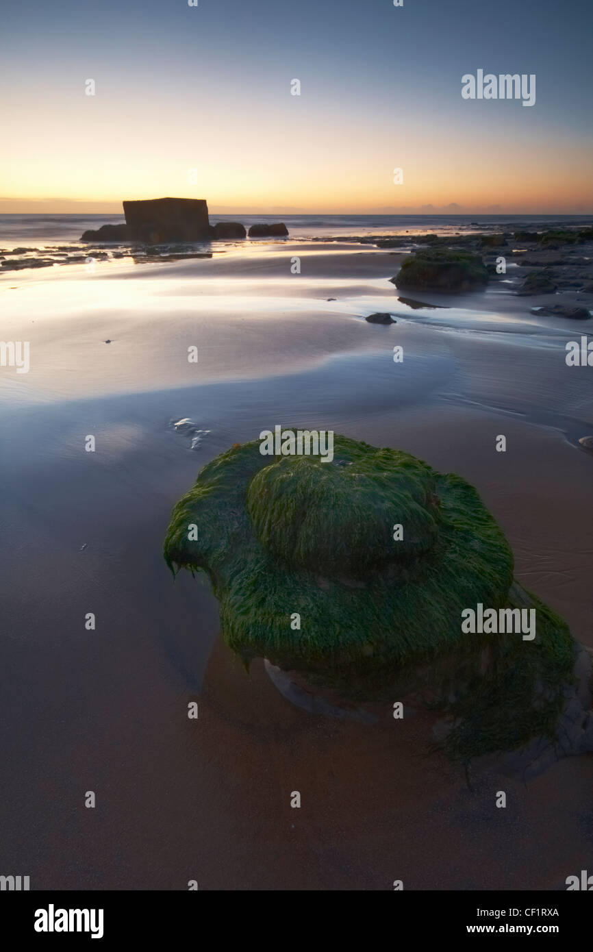 A pillbox on the beach at the Naze in early dawn light. Stock Photo