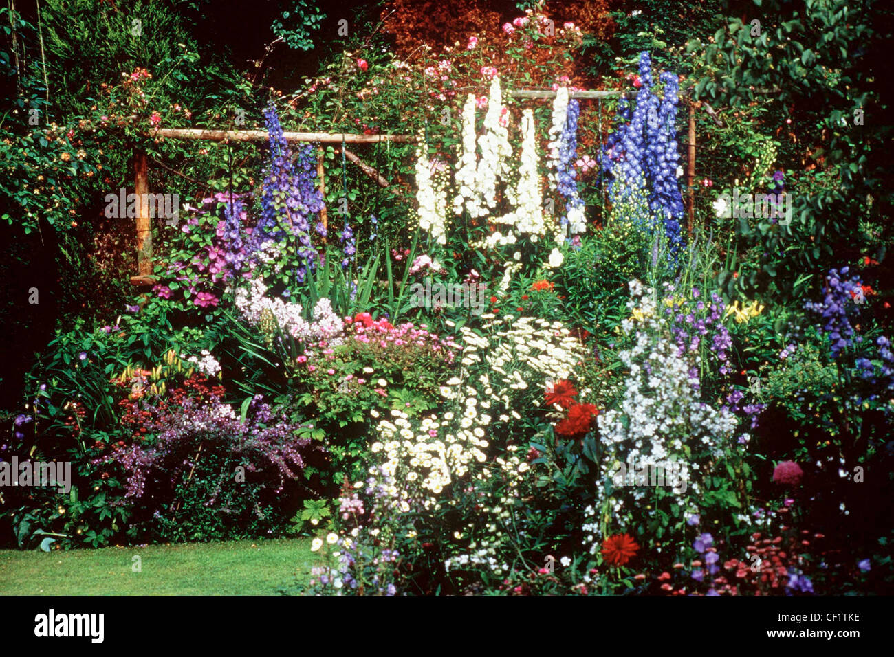 WOODEND COTTAGE GARDEN This colourful garden is set behind former