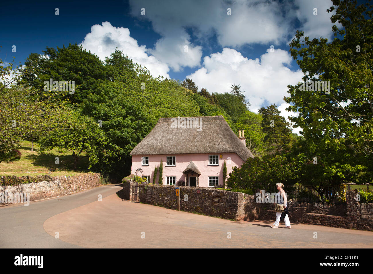 UK, England, Devon, Torquay, Cockington, visitor walking through the