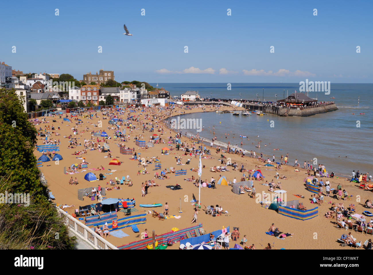 Holiday makers on the beach in Viking Bay, Broadstairs, the main beach in the town. Stock Photo
