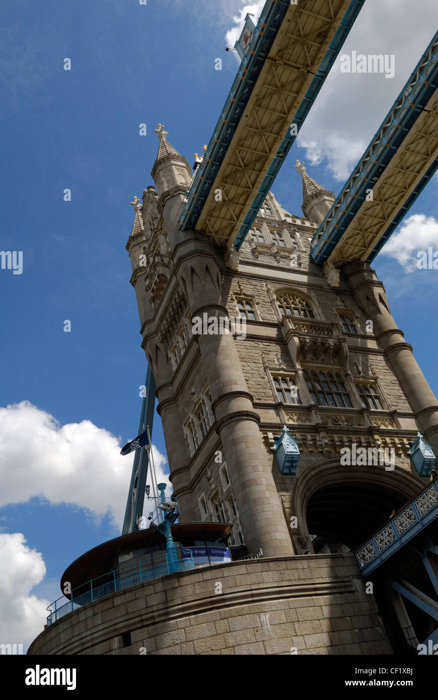 Looking up at one of the towers of Tower Bridge, one of London's most iconic landmarks. Stock Photo