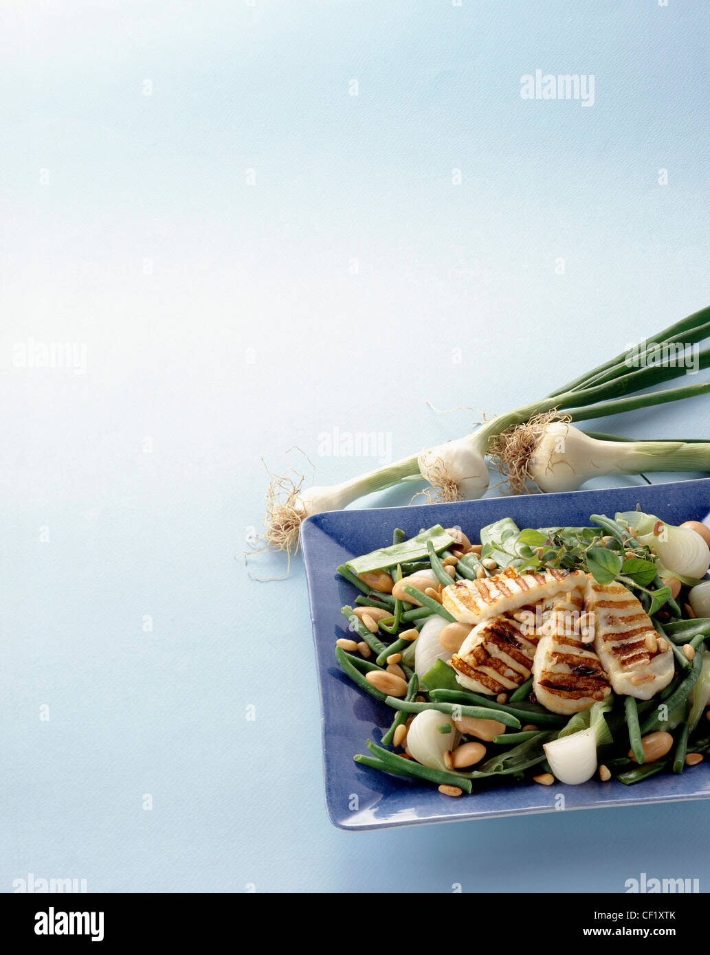 Bean salad grilled halloumi cheese, green beans, sugar snap peas, spring onions and large white