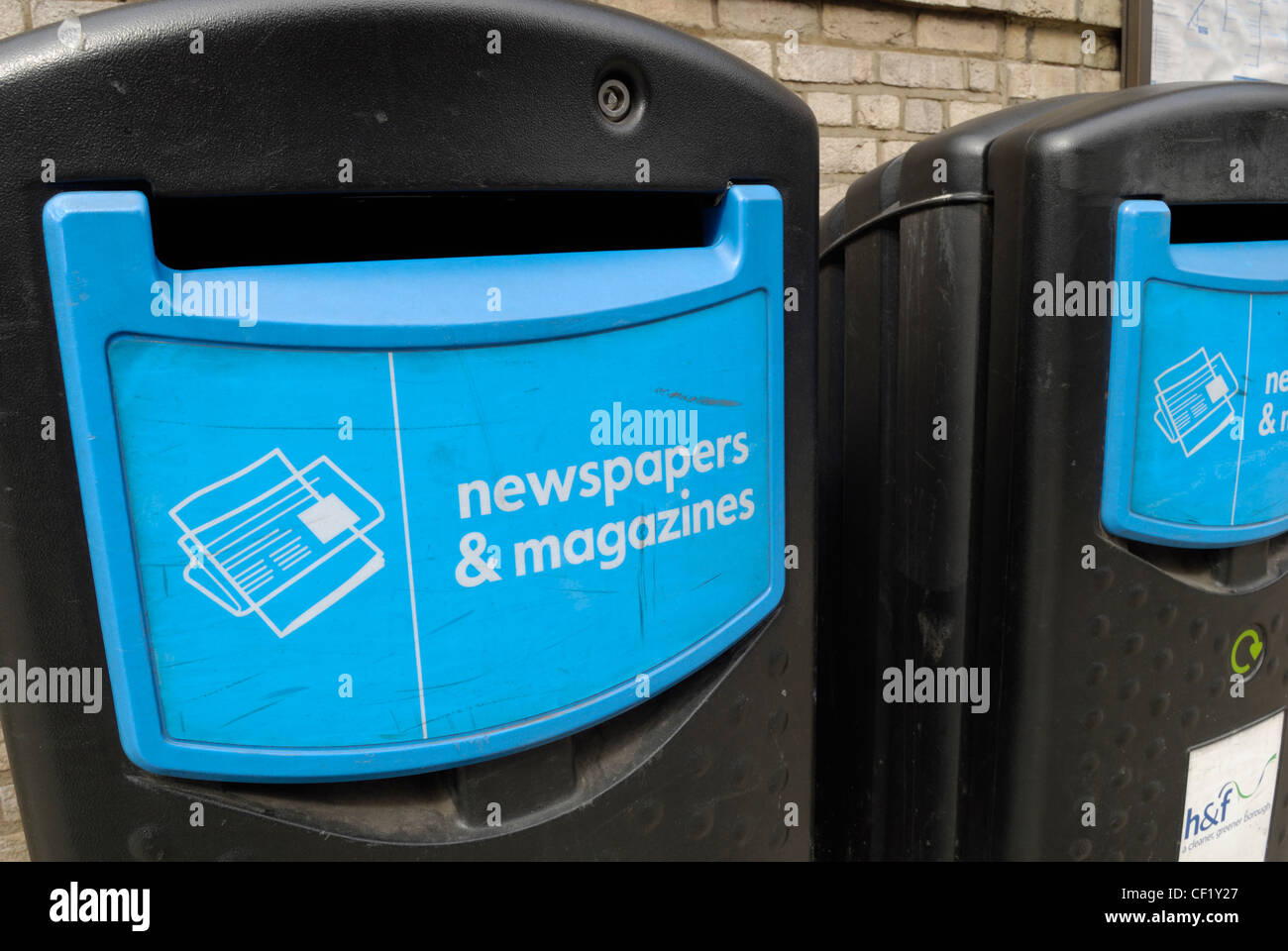Newspaper and magazine recycling bins outside Parsons Green tube